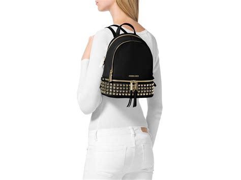 michael michael kors rhea zip extra small studded backpack|signature rhea zip medium backpack.